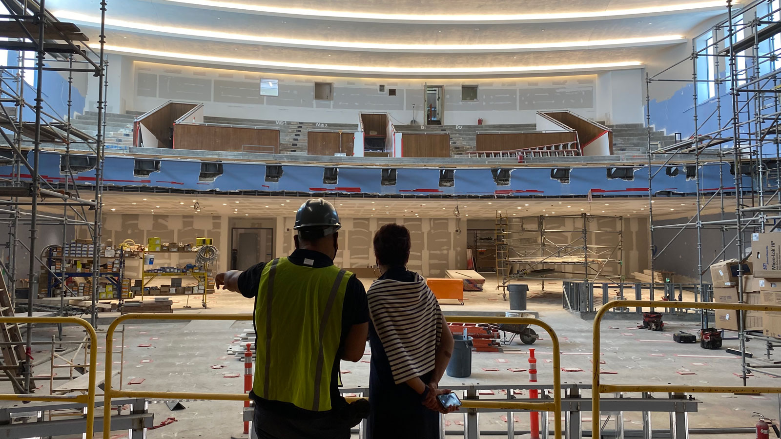 Looking over renovations in Palmer Auditorium