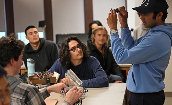 Students in the COM 310 Robotics class.