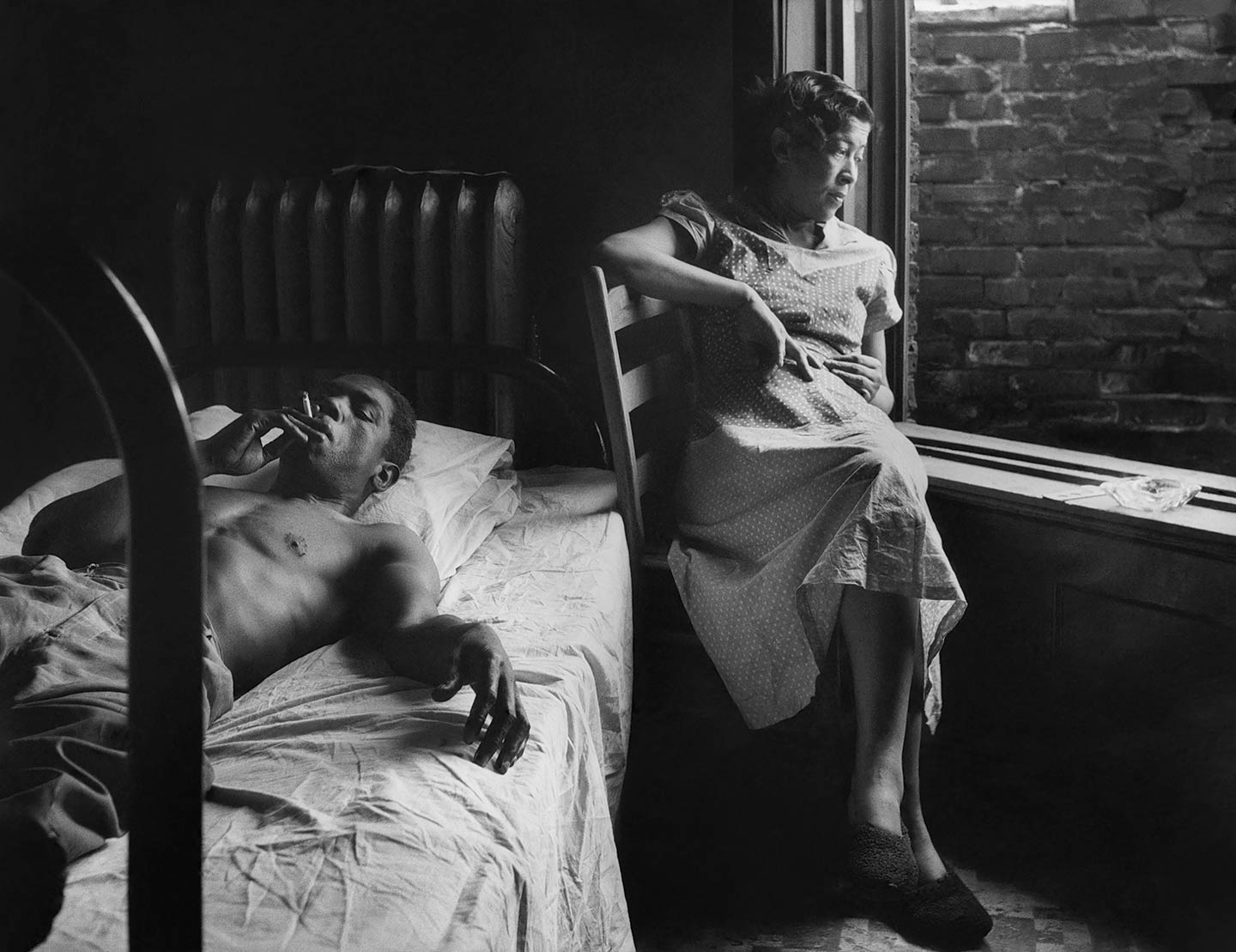 Tenement Dwellers, Chicago, Illinois, 1950, man and woman in tenement