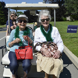 Alicia Speaker '43, left, and Barbara Brewster '43 catch a ride during Reunion 2013.   