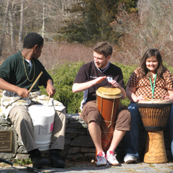 Connecticut College students host a drumming circle with students from New London's Bennie Dover Jackson Middle School. The middle school students were on campus as part of an after-school enrichment program.