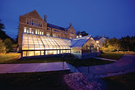 The greenhouse of New London Hall glows at night