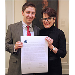 SGA President Evert Fowle '14 (left) and President Katherine Bergeron signed a copy of the College's Shared Governance Covenant in February. The document, which each year reaffirms the College's commitment to shared governance, is also signed by the chairs of the faculty and staff representative bodies.