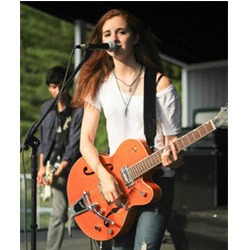 Haley Gowland '17 sings lead for the Cranks as the band opened for Paramore, Fall Out Boy, and New Politics in New Hampshire.