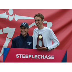 Mike LeDuc '14, pictured here with Coach Jim Butler, wins his third NCAA national championship today with a posted time of 8:45.77 in the 3,000 meter steeplechase.