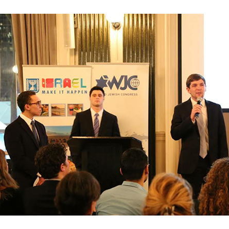 Daniel Kramer '18 (left), Connor Wolfe '17 (center) and Simon Luxemburg '18 (right) present during the live pitch competition at Manhattan’s WeWork Bryant Park.