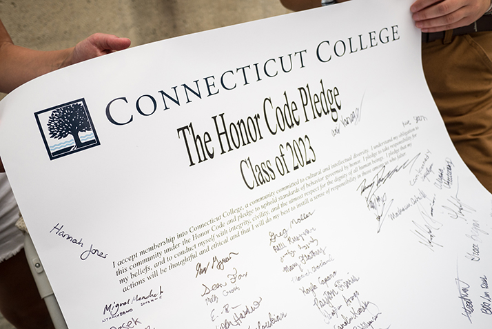 Members of the Class of 2023 sign the Honor Pledge