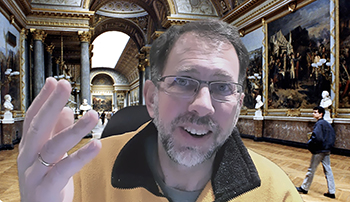 Professor Steiner teaches on Zoom with a Palace of Versailles background.