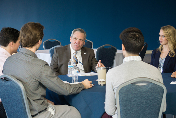 New London Mayor Michael Passero ’79 talks with students during Fast Forward.