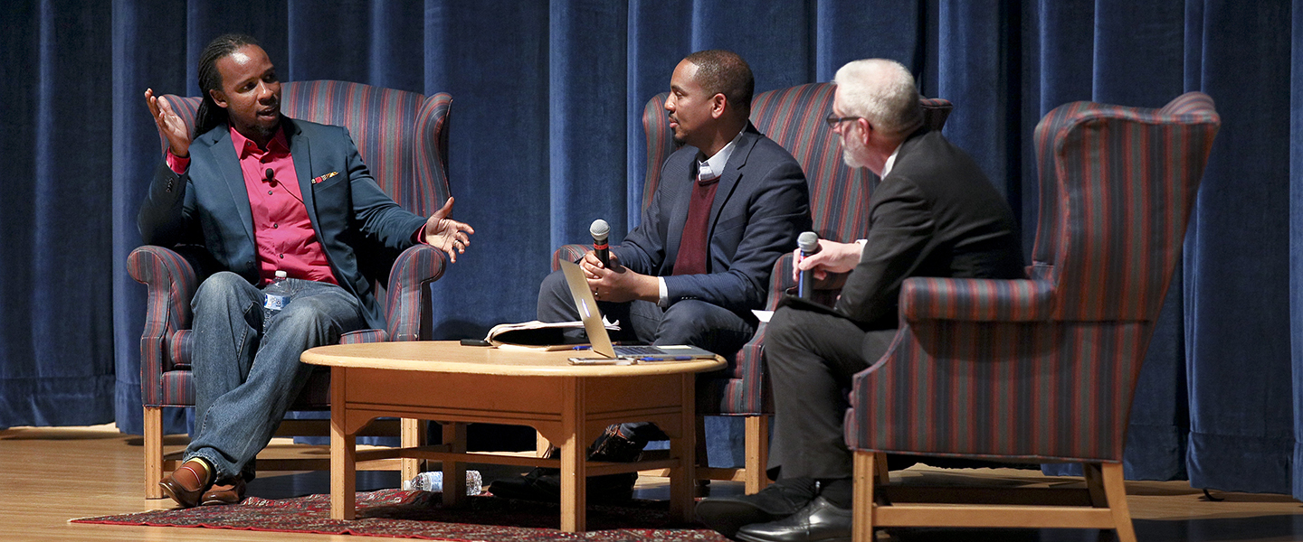 Ibram X. Kendi, DIEI John McKnight and USCGA Chief Diversity Officer Aram deKoven onstage during the Q and A portion of the event.