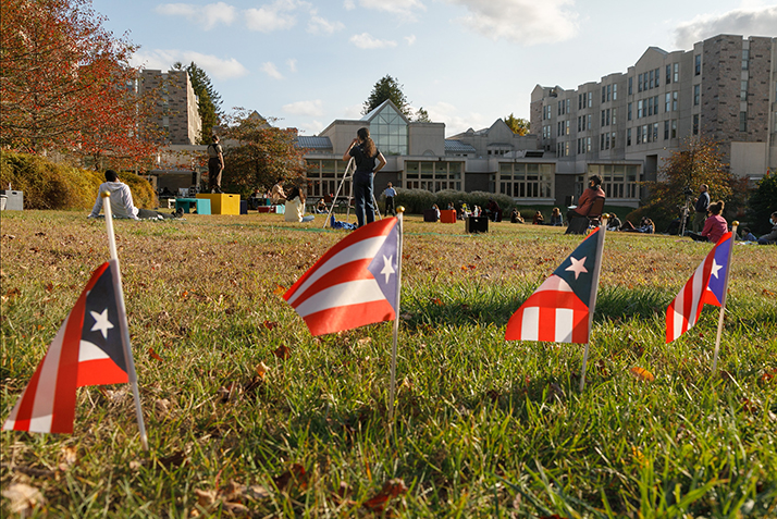 Puerto Rican flags line the outdoor set for the performance of Seven Twenty-Five.
