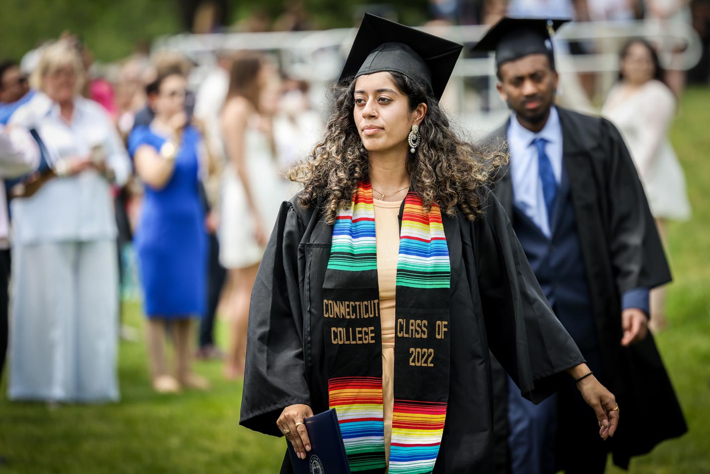 A student processes during Commencement