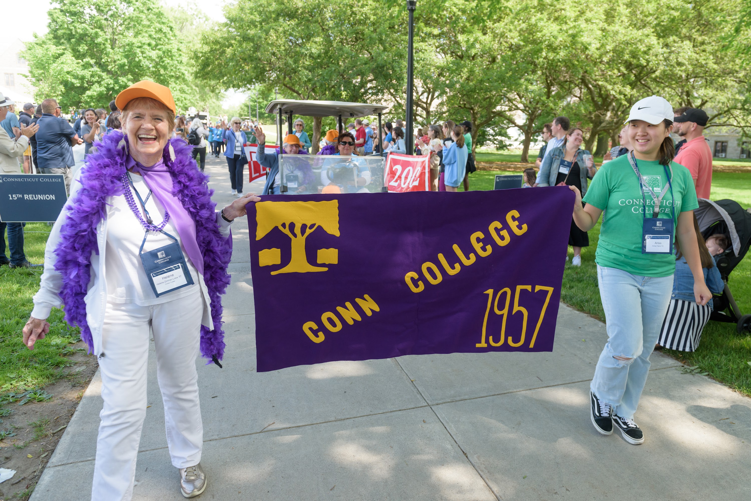 Members of the Class of 1957 show off their purple boas at Reunion 2022.