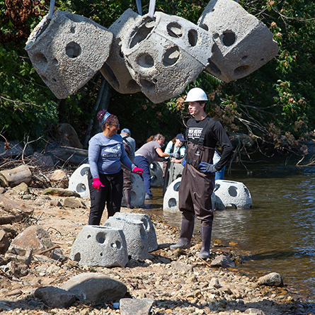 With three new grants, Professor Maria Rosa and her team are deploying 80 reef balls made of pH-balanced concrete to create a living shoreline that will help restore Connecticut’s tidal marshes. Photos by Dominique Sindayiganza/11th Hour Racing