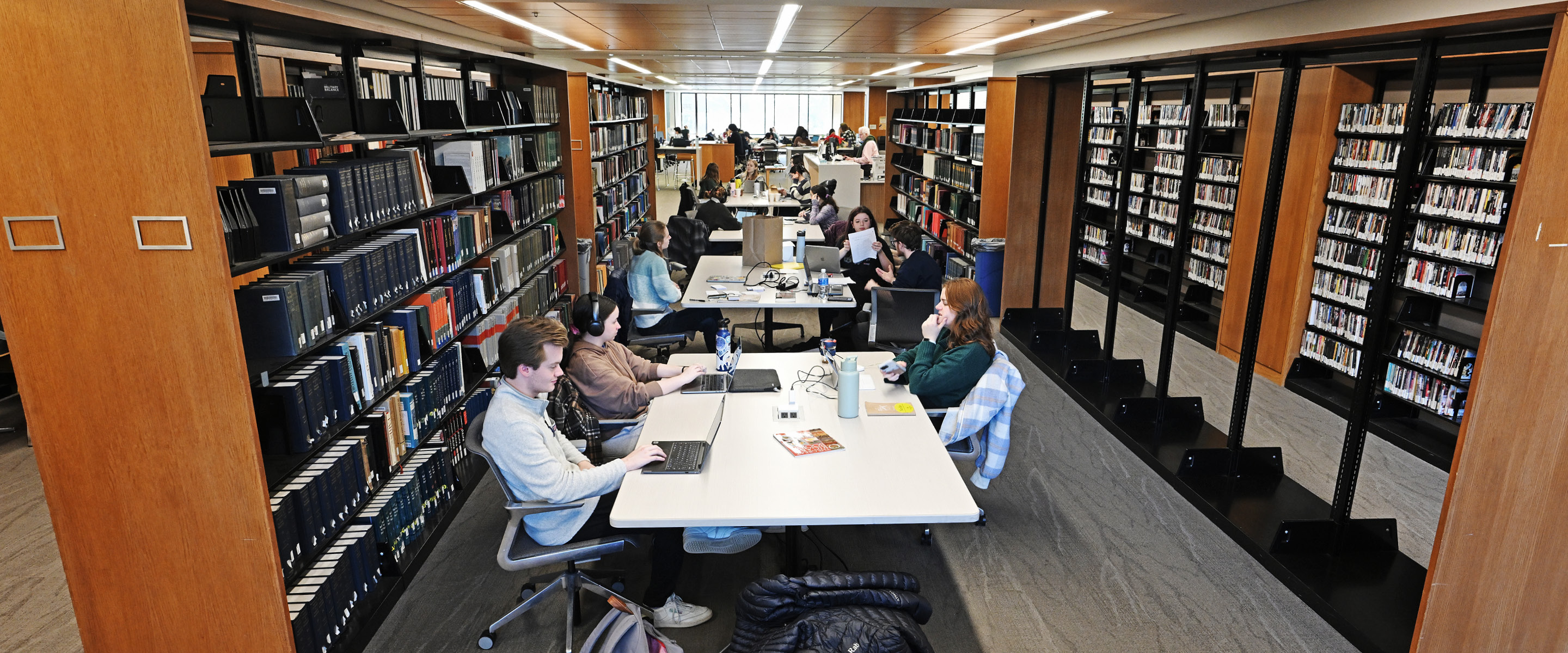 Panoramic shot of students studying in Shain Library during finals.