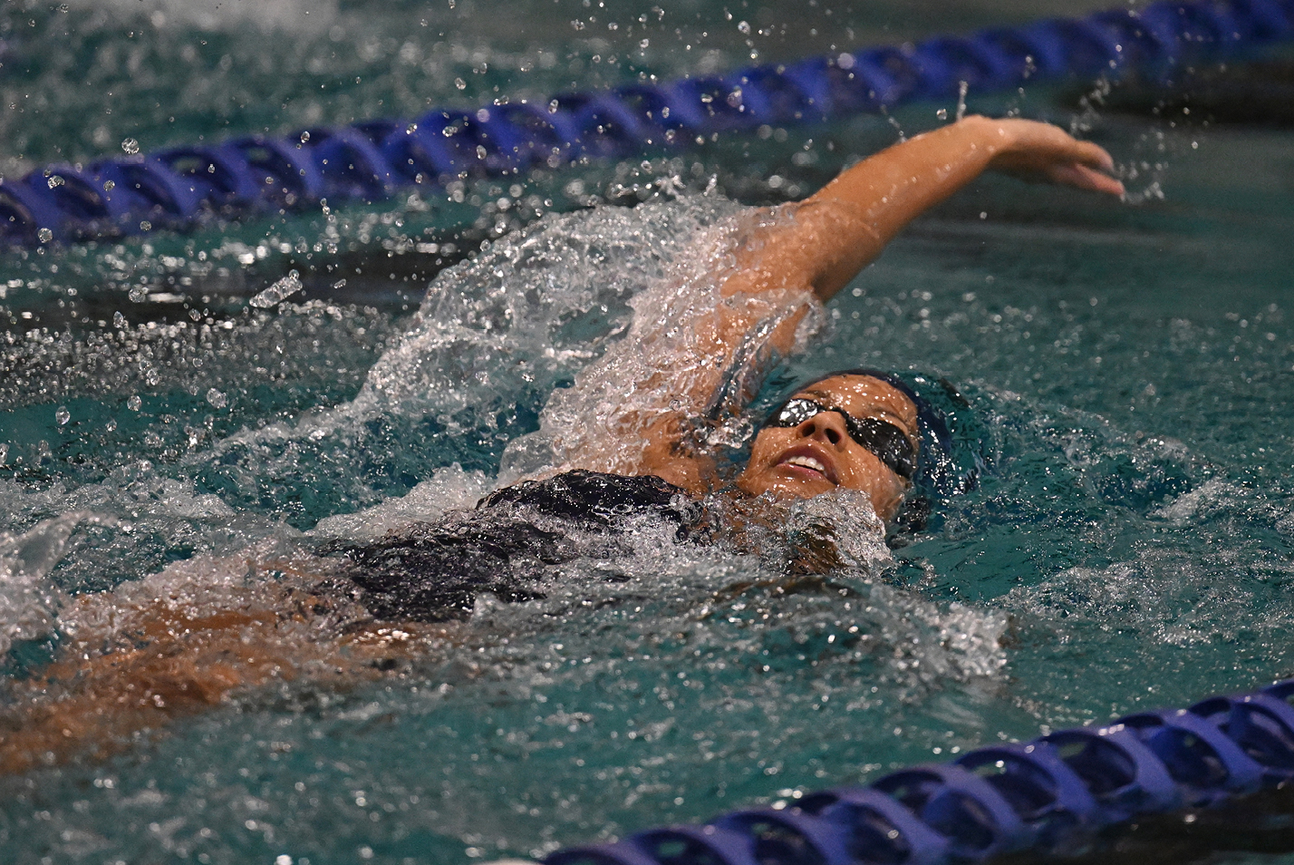 Sarah Franco swims the 200 backstroke for Connecticut College men’s and women’s swimming v. Amherst.