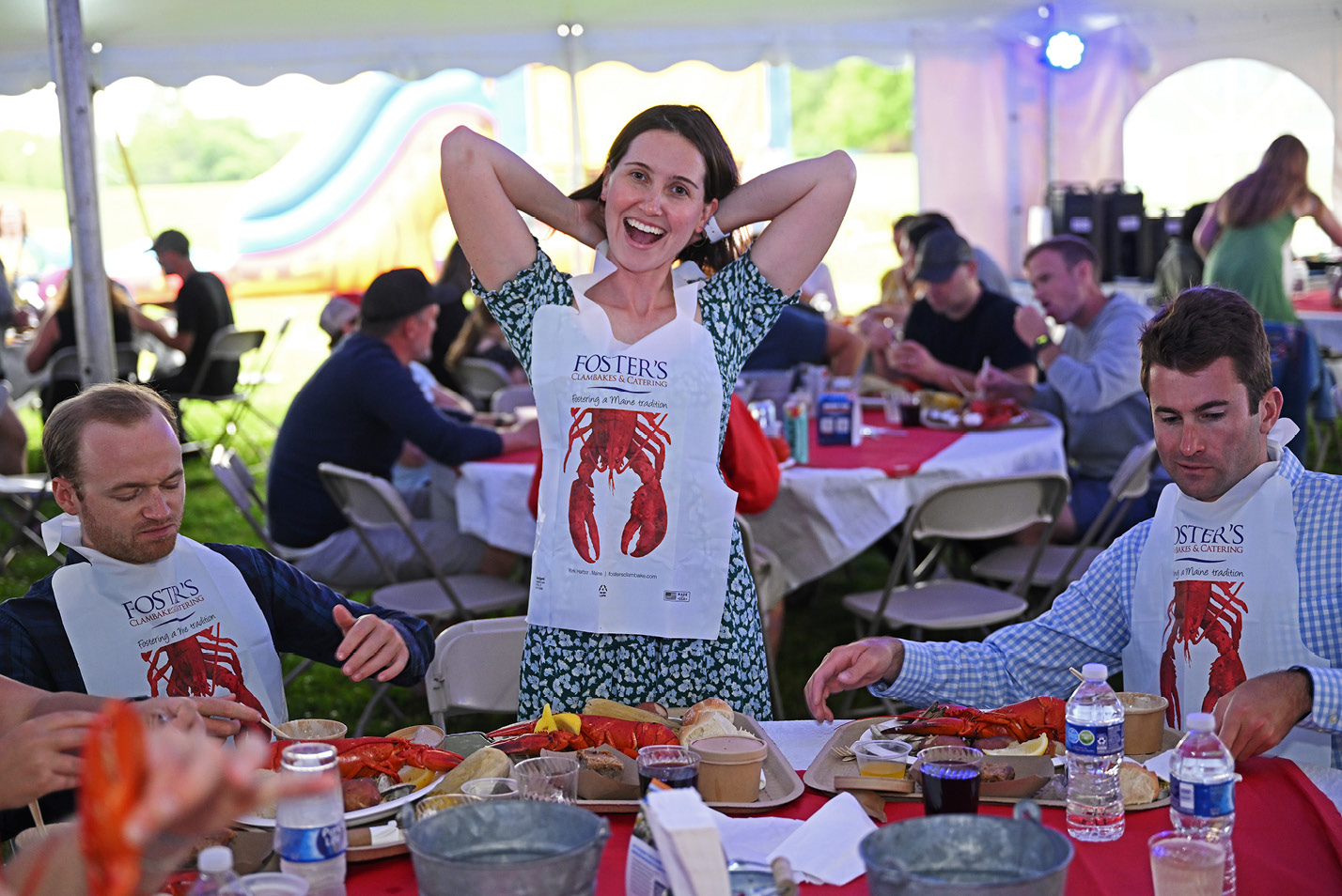An alum smiles at the lobster bake at Reunion.
