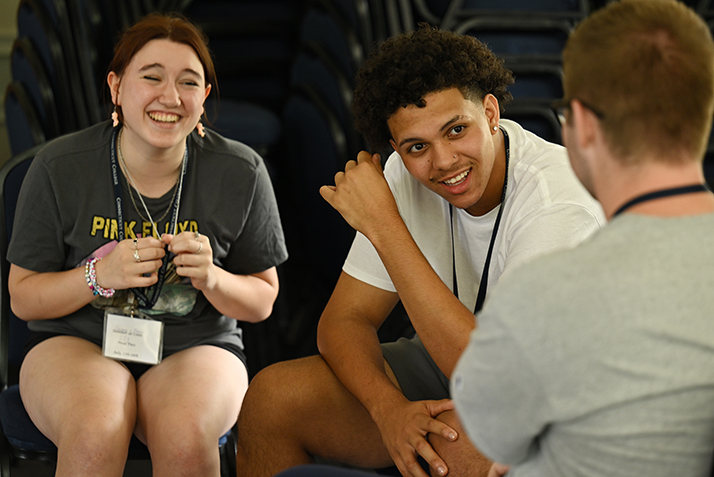 Students participating in the Summer@Conn Global Focus program share a laugh.