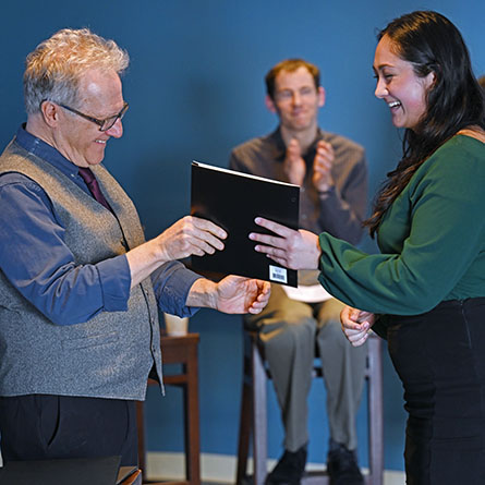 Lia Dietrich '23 accepts her Winthrop Scholars certificate from Professor Lawrence Vogel.