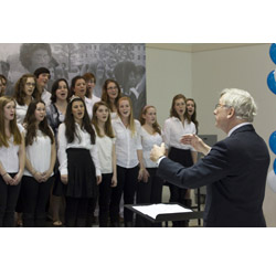 Retiring Professor of Music Paul Althouse leads the Connecticut College Chamber Choir in the singing of the College's Centennial Song at Founders Day in 2011.
