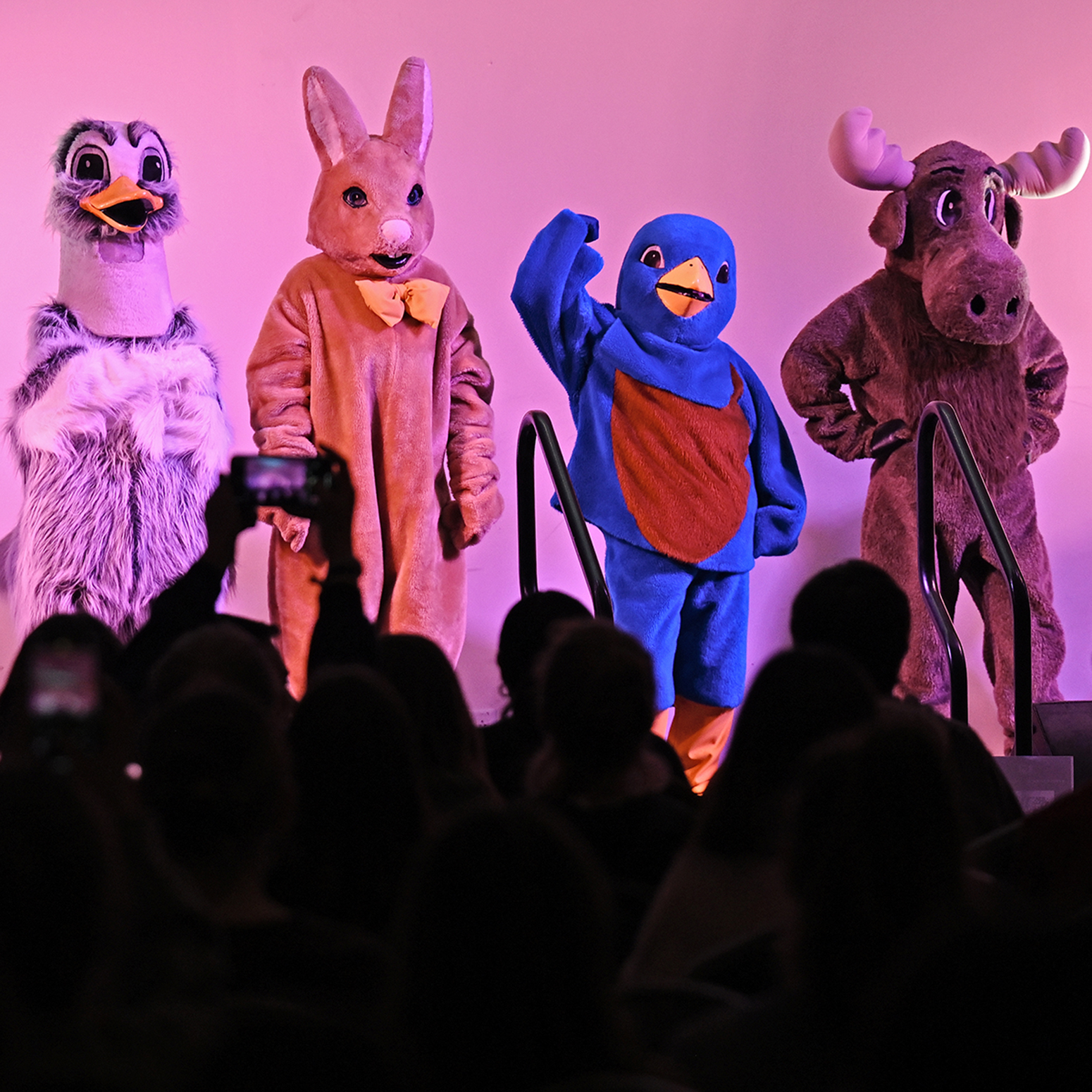 Students in costume on stage
