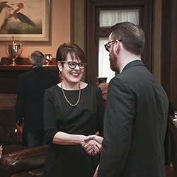 Connecticut College President Katherine Bergeron and New London Mayor Daryl Justin Finizio greet each other at the March 27 community reception. The event was the first in a series leading up to Bergeron's April 5 Inauguration.